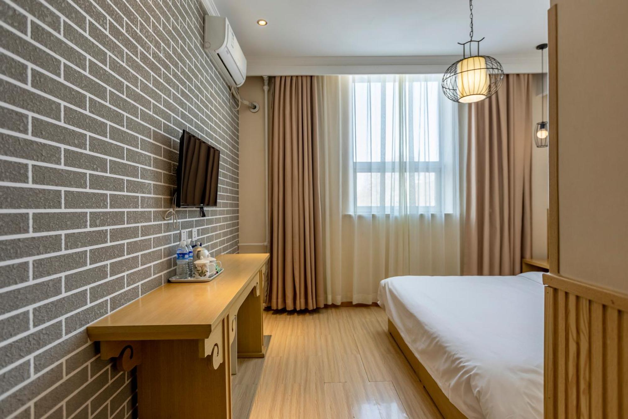 Happy Dragon Alley Hotel: Center Charm With Free Coffee & Tourist Services Hotel Pequim